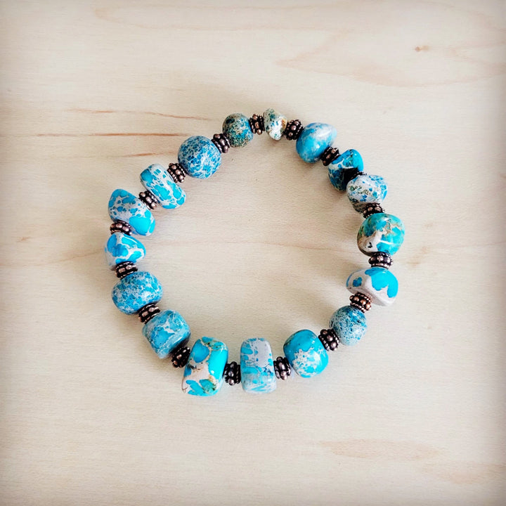 Turquoise and copper stretch beaded bracelet with oval and round bead mix