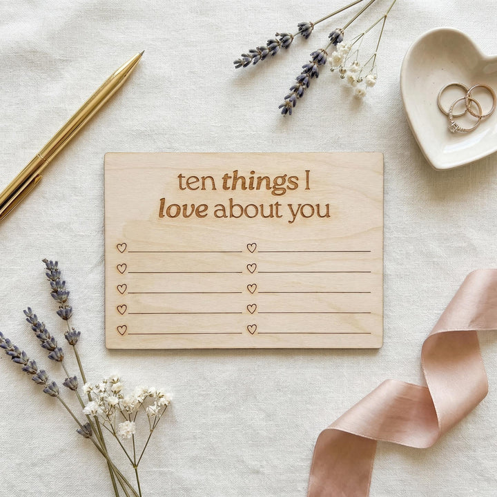 Engraved wooden love note card reading &