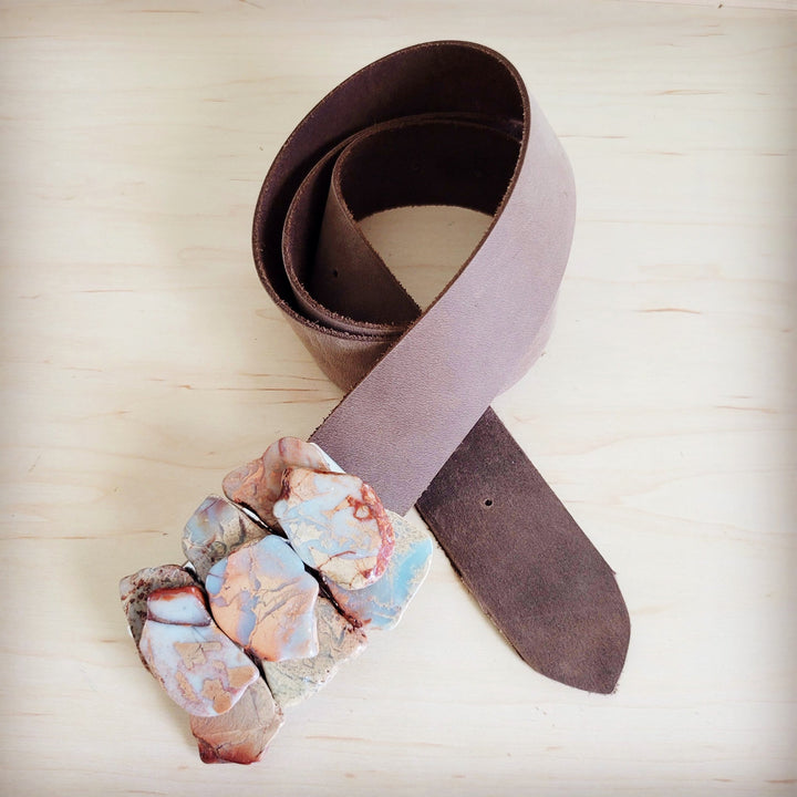 Distressed brown leather belt with stone cluster buckle accent and silver buckle