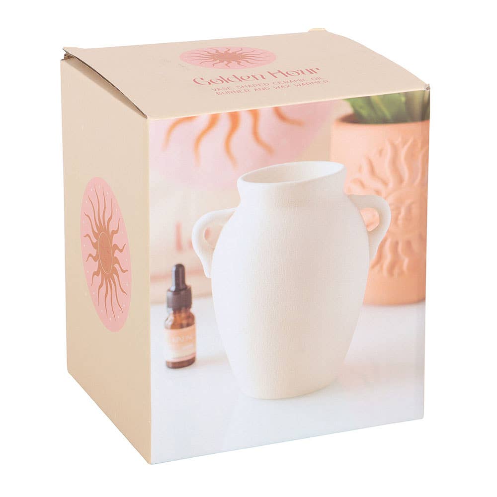 Vase-shaped oil burner and wax warmer gift box featuring a white ceramic burner
