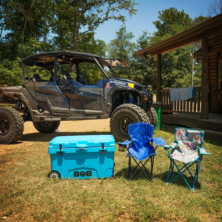 Cool Blue hard cooler on wheels with BOB logo and black side straps