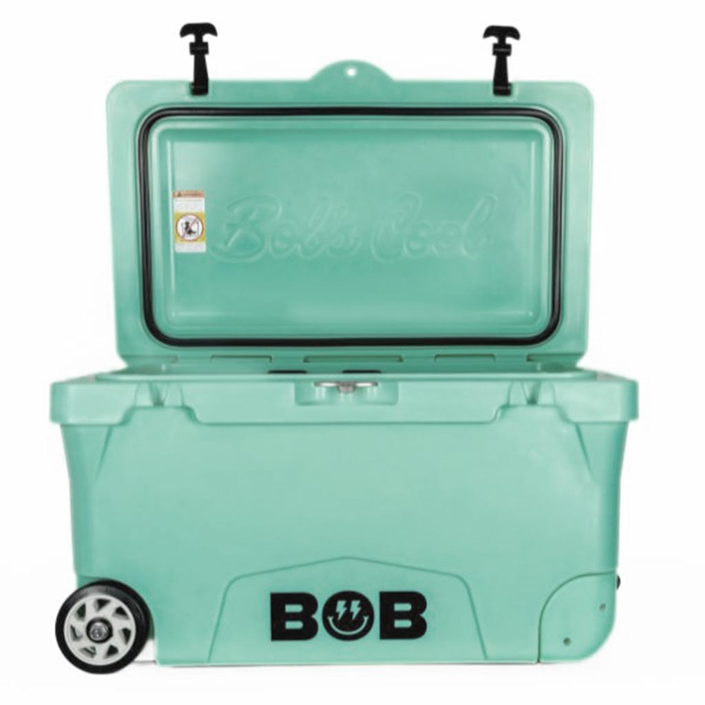 Palm green hard cooler with open lid, handle detail, and black BOB logo.