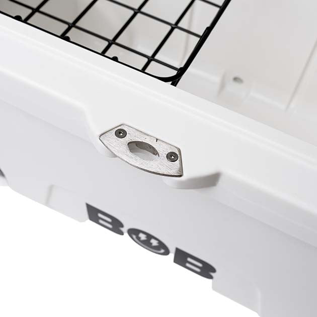 White hard cooler with metal drain plate and grid basket inside