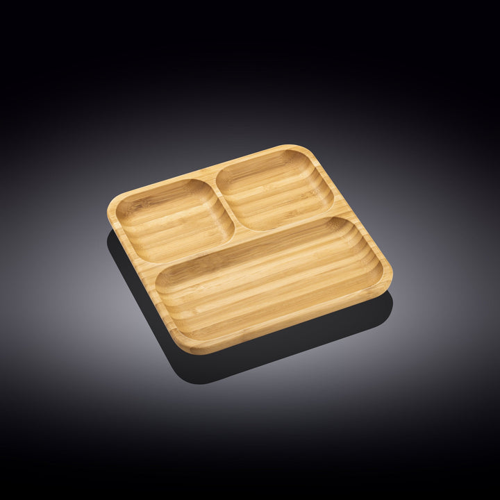 Square bamboo divided bento dish with four compartments, empty and ready to fill