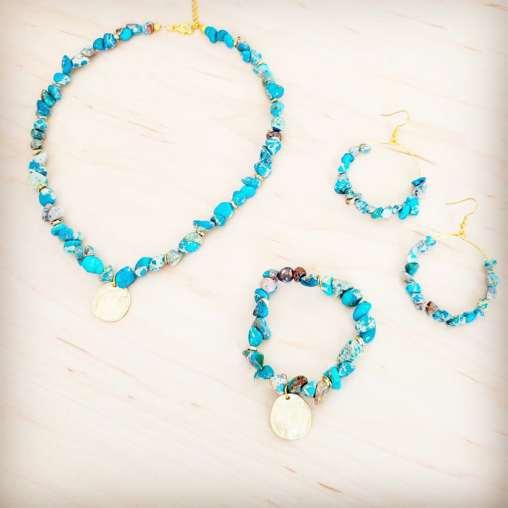 Turquoise beaded collar necklace with round gold coin charm and matching hoop earrings