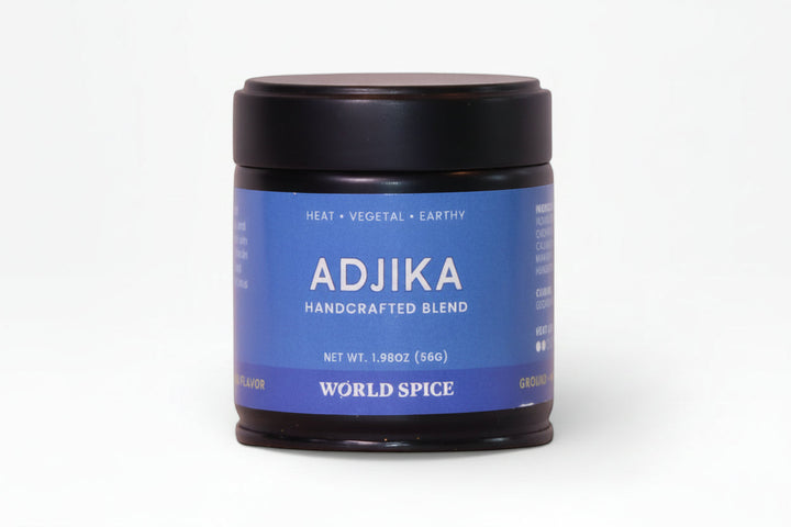 Adjika seasoning jar with black lid and blue label, net wt 1.9 oz