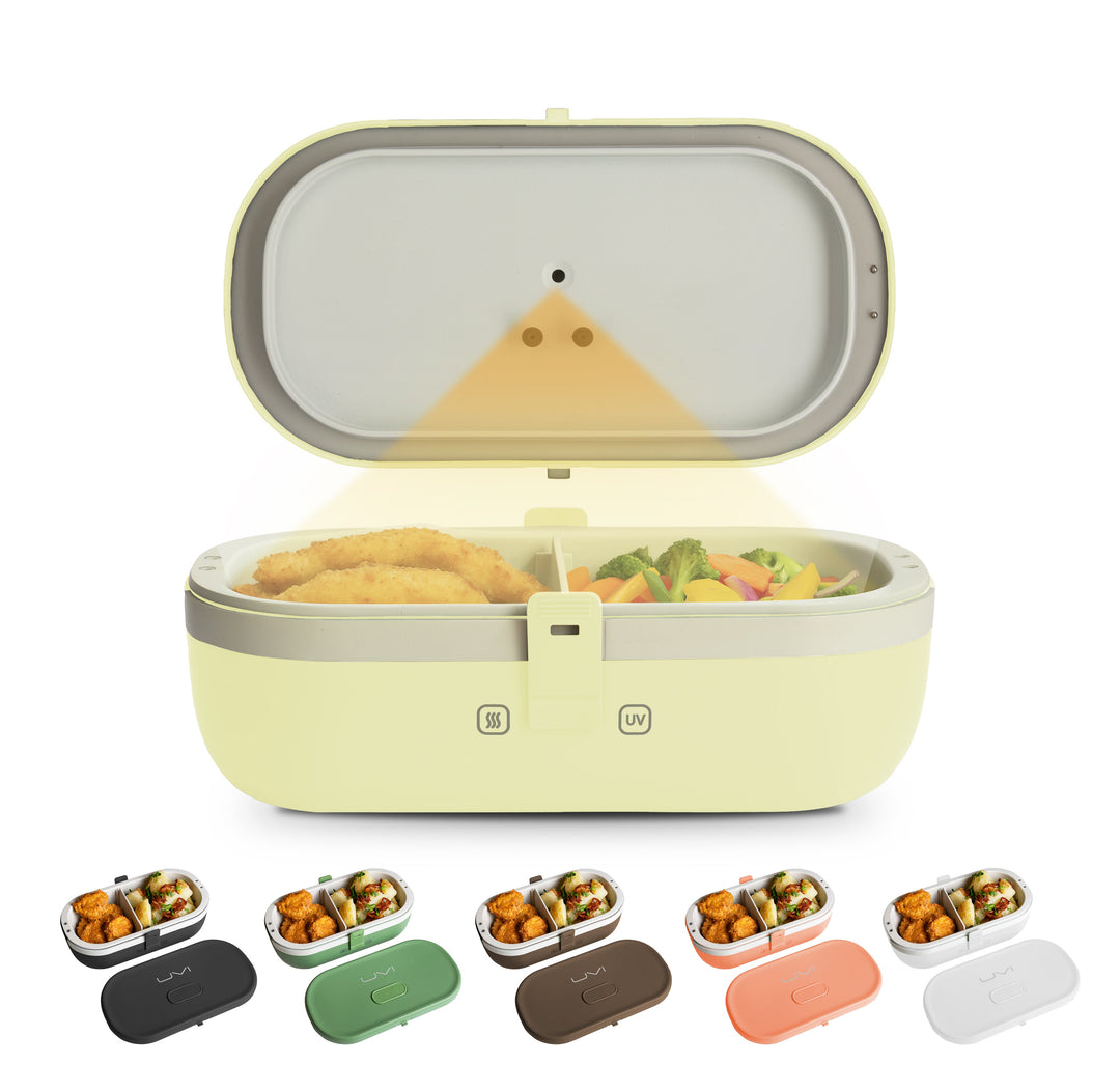 Light yellow self-heating lunch box open with food inside and front latch strap