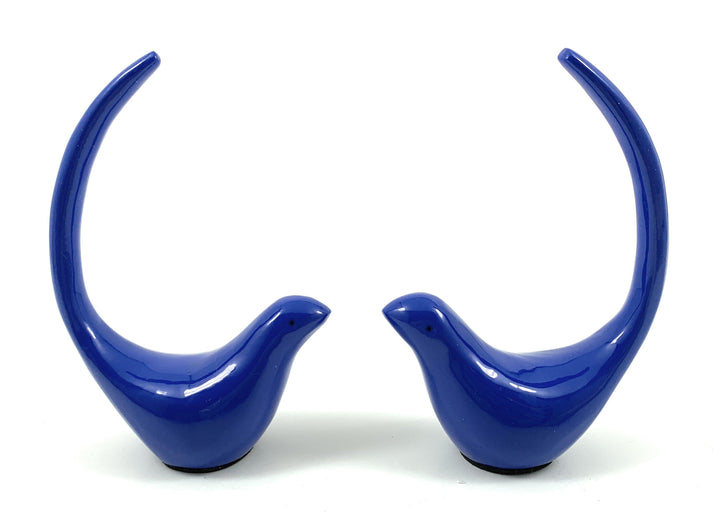 Blue bird figurine pair, curved open backs, on white background