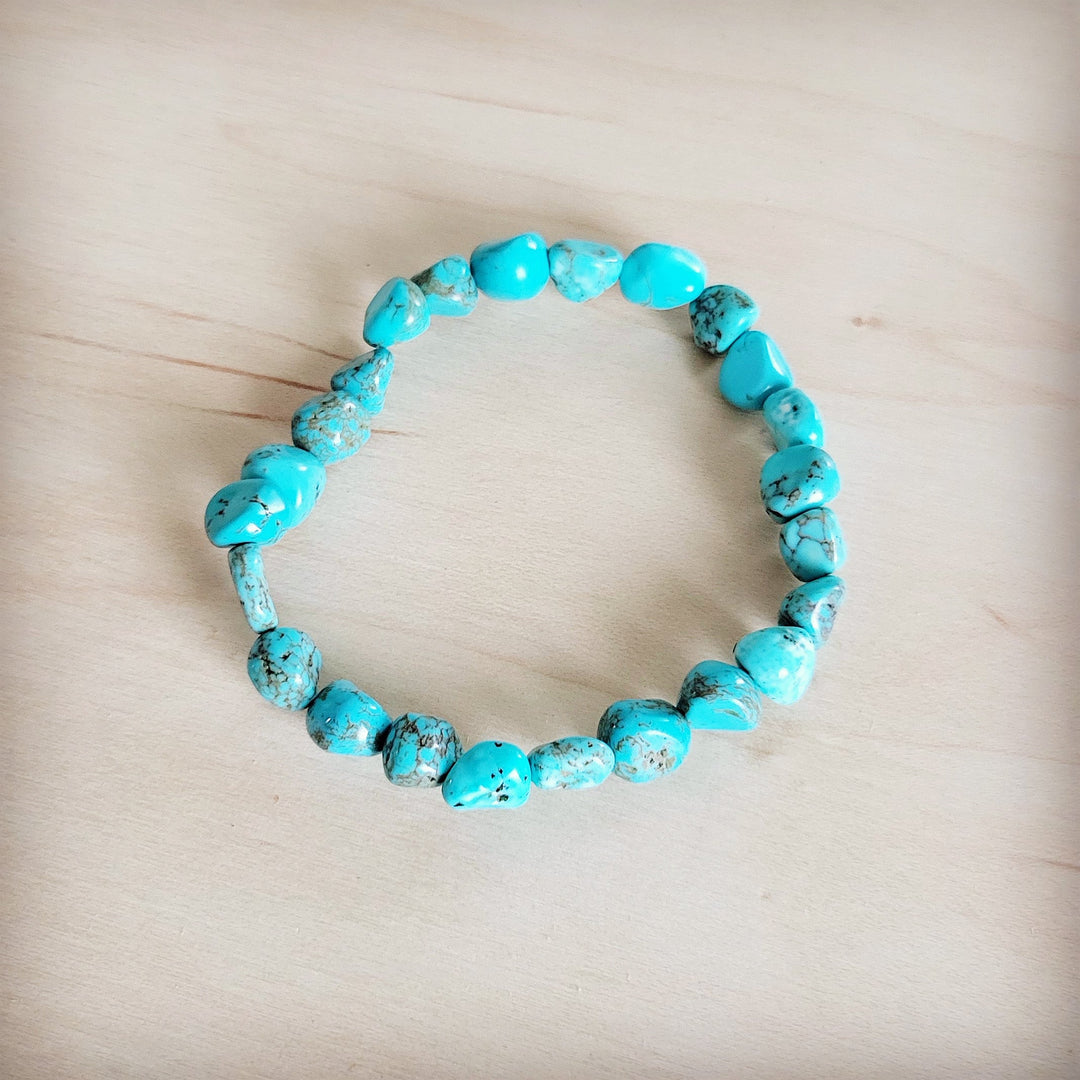 Turquoise beaded stretch bracelet with small round beads, bright blue-green