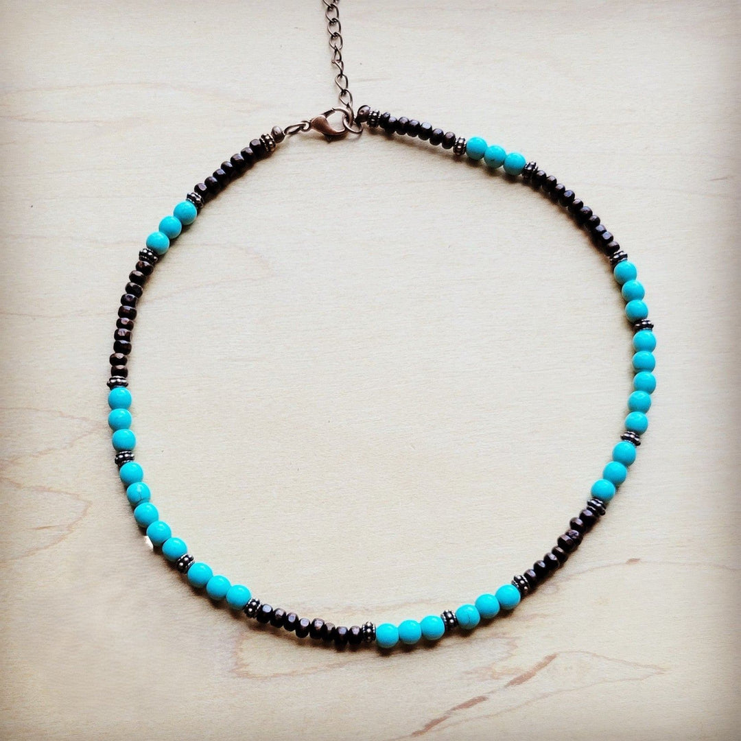 Turquoise blue bead collar necklace with dark bead row and copper-tone clasp chain.