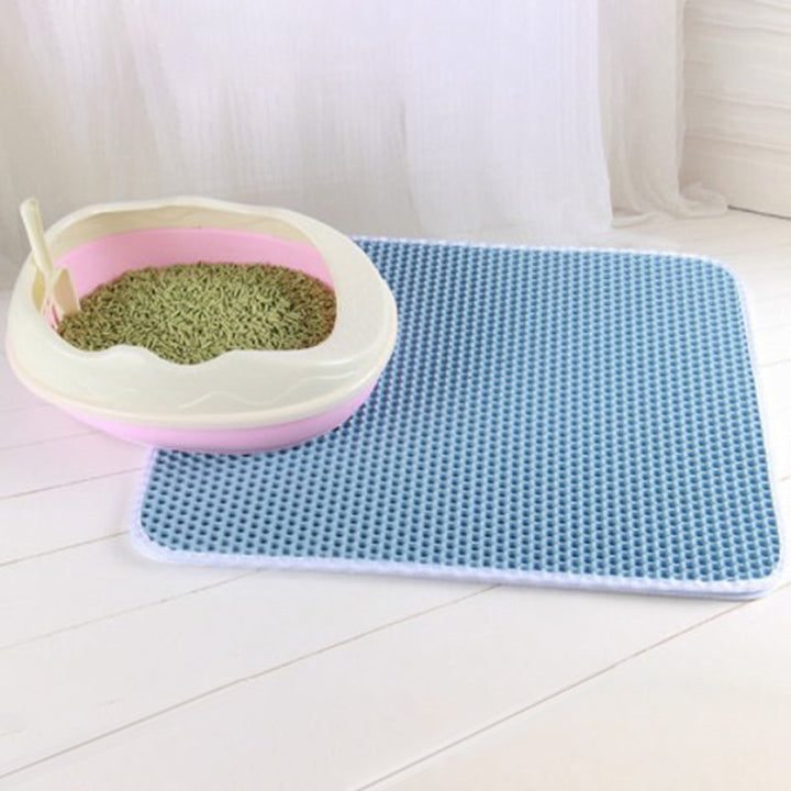 Blue EVA pet cat litter pad mat with honeycomb surface and trimmed edges