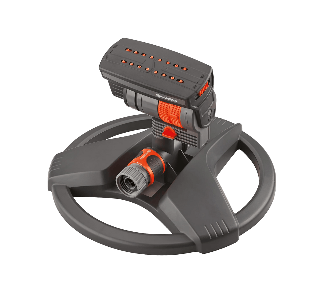 Oscillating garden sprinkler with orange control dial on weighted sled base