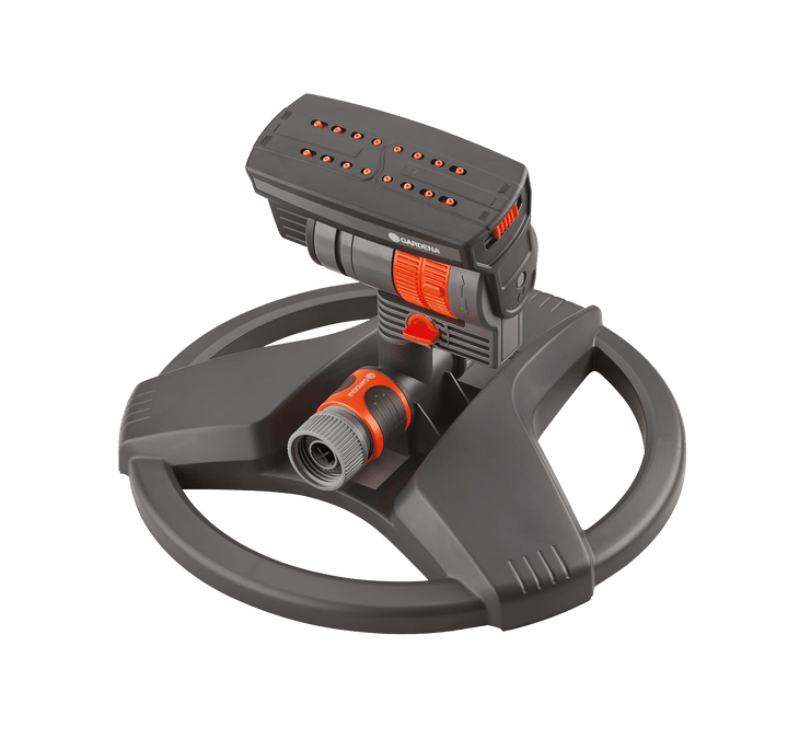 Oscillating garden sprinkler with orange control dial on weighted sled base