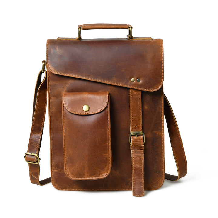 Brown leather crossbody bag with front flap, pocket, and adjustable strap