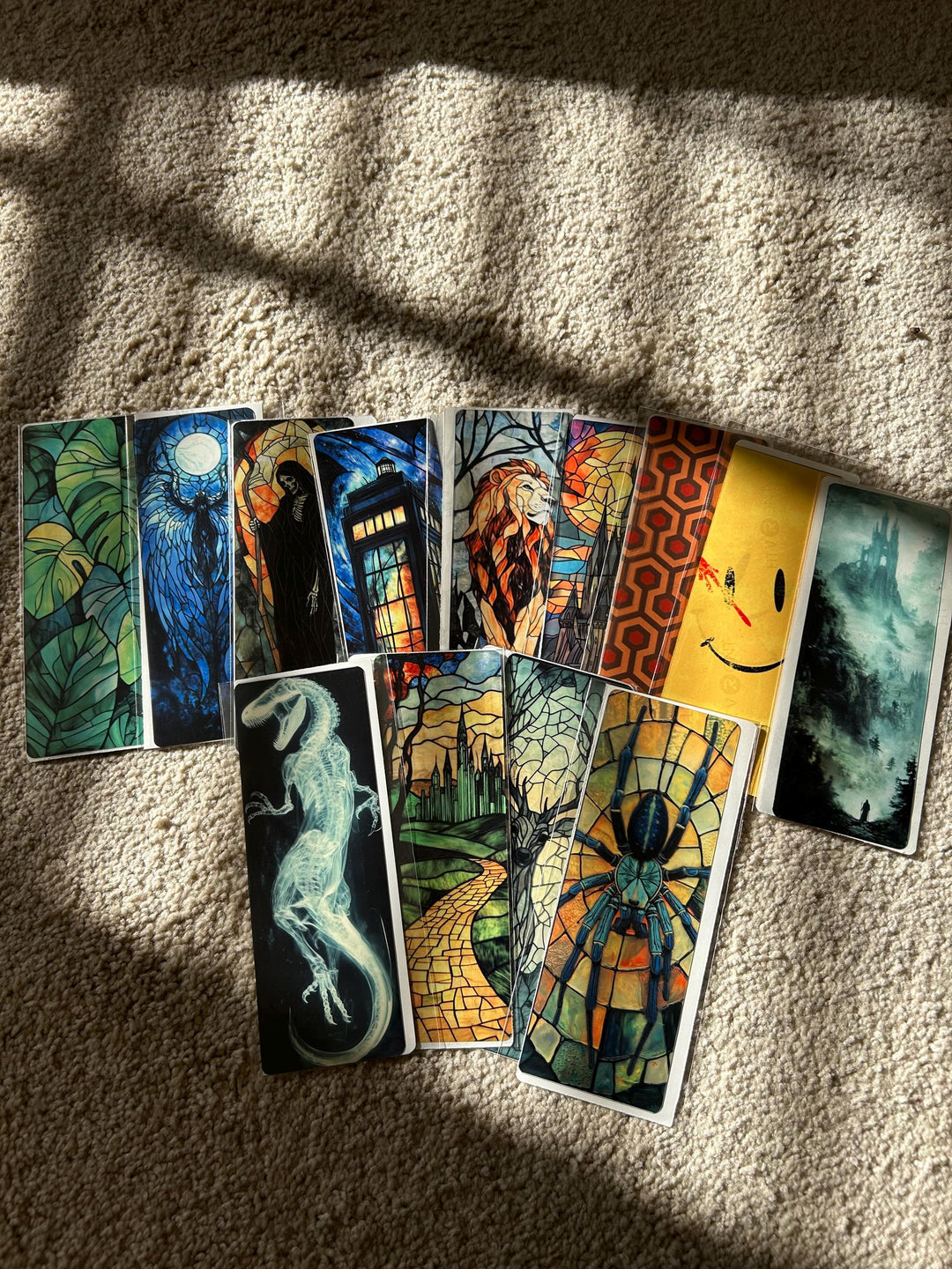 Handmade axolotl bookmark set, blue axolotl design among several colorful bookmarks