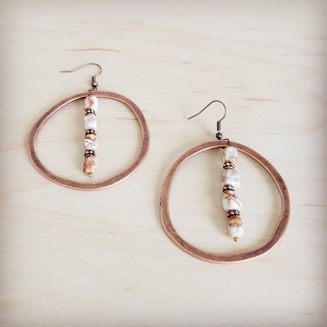 Copper hoop earrings with long bead-stacked drop and small white stone charm