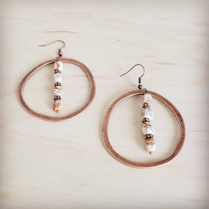 Copper hoop earrings with long bead-stacked drop and small white stone charm