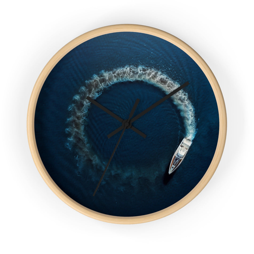 Round wall clock with blue nautical artwork, wooden rim, black clock hands