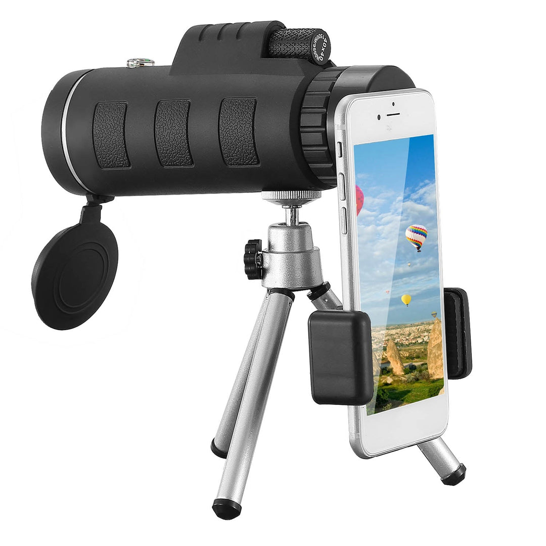 Black optical monocular telescope with tripod, phone holder, and side focus knob.