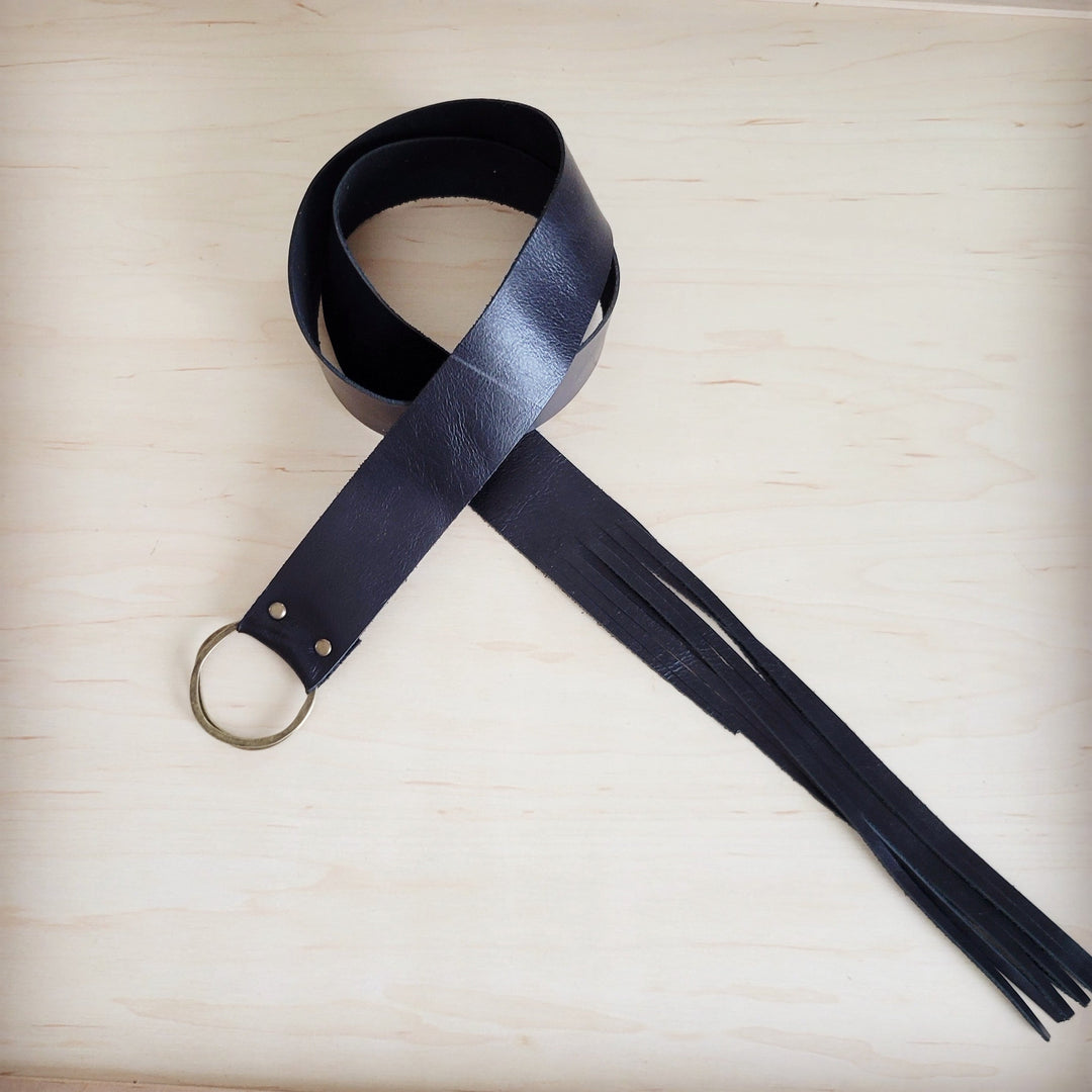 Black leather belt with fringe tie closure and round metal grommets