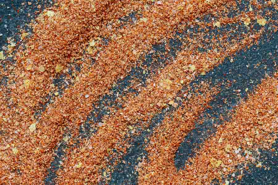 Buffalo spice blend with red, orange, and blue granules