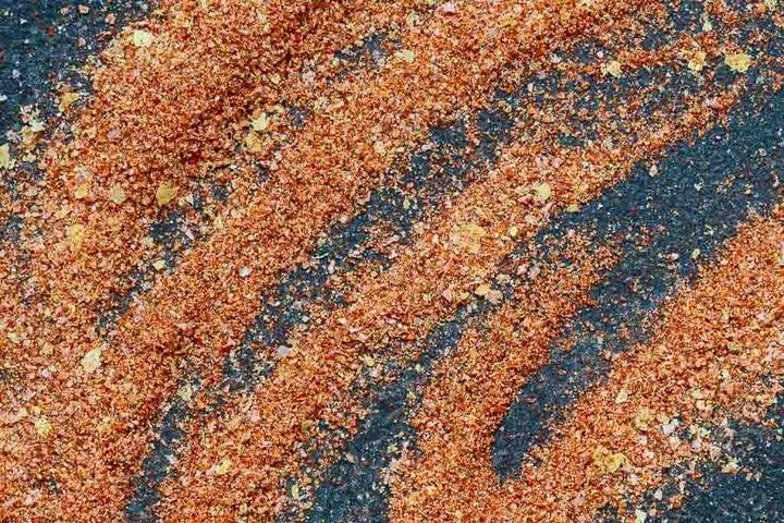 Buffalo spice blend with red, orange, and blue granules