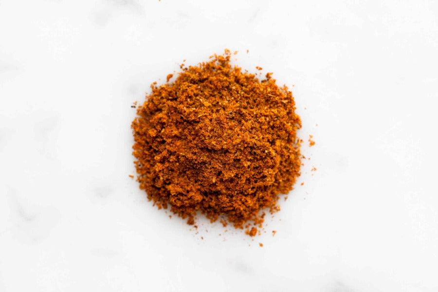 Mound of orange-brown ground spice blend