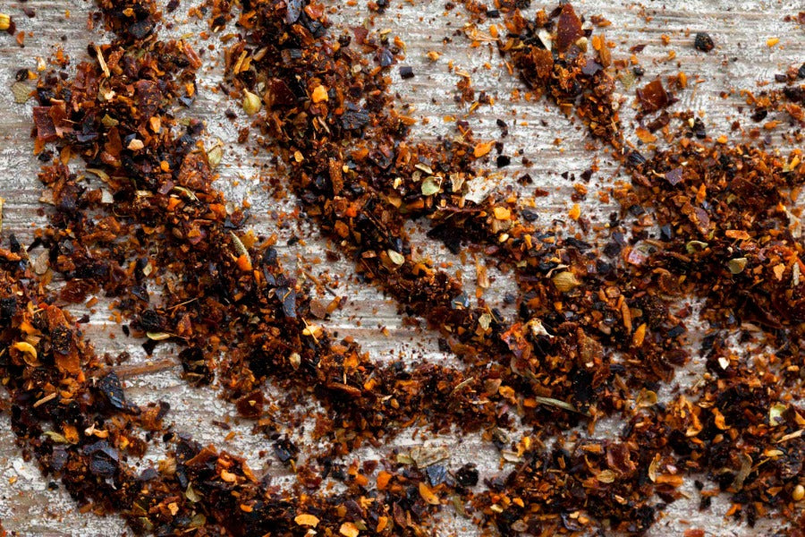 Chimichurri spice blend, coarse herbs and seasonings in a pile