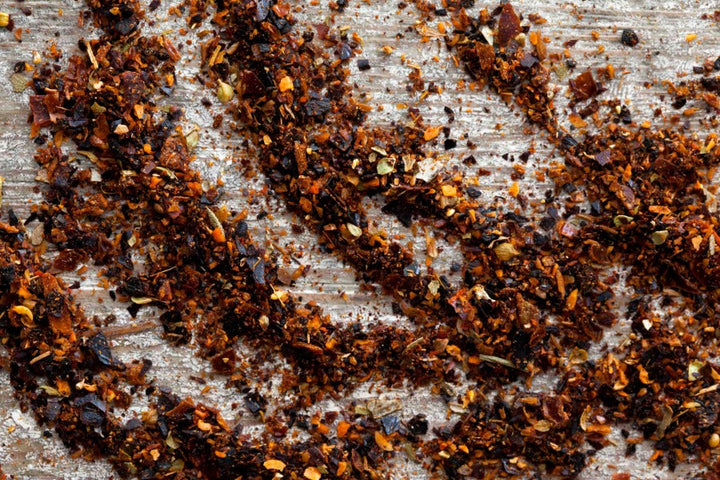 Chimichurri spice blend, coarse herbs and seasonings in a pile