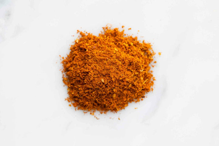 Orange curry spice powder mound