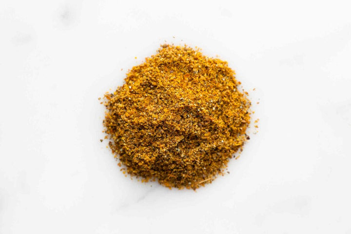 Vadouvan curry ground spice powder mound