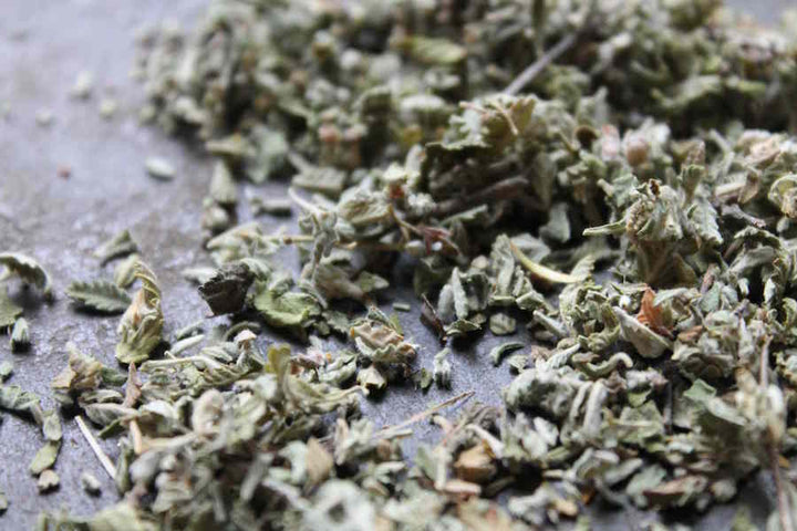 Damiana dried herb flakes, coarse green and gray pieces