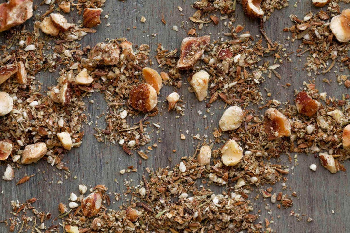 Hazelnut dukkah seasoning blend with chopped hazelnuts, spices, and herbs