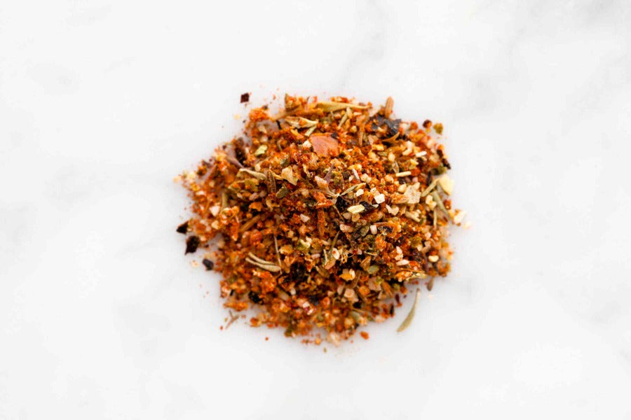 Fajita and Taco spice blend mound of ground and dried herb flakes