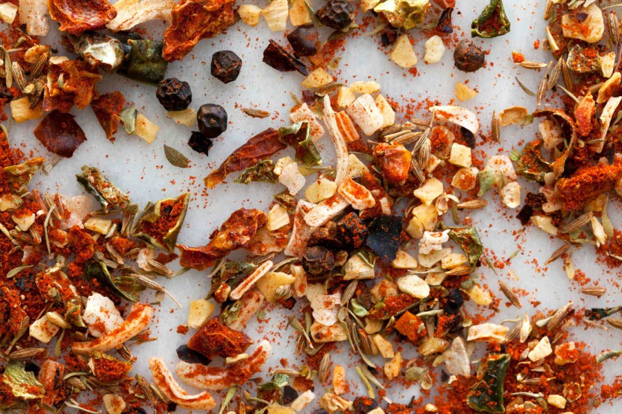 Fajita and Taco spice blend, coarse chopped herbs and seasonings in a scattered pile
