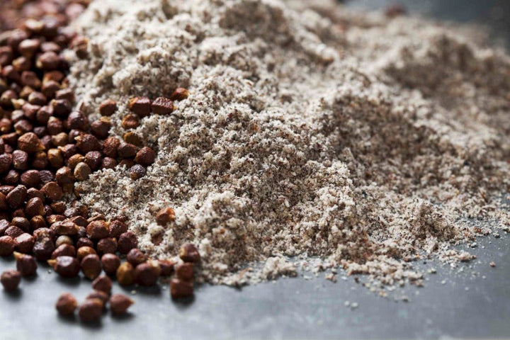 Grains of Paradise ground spice powder, light brown dust