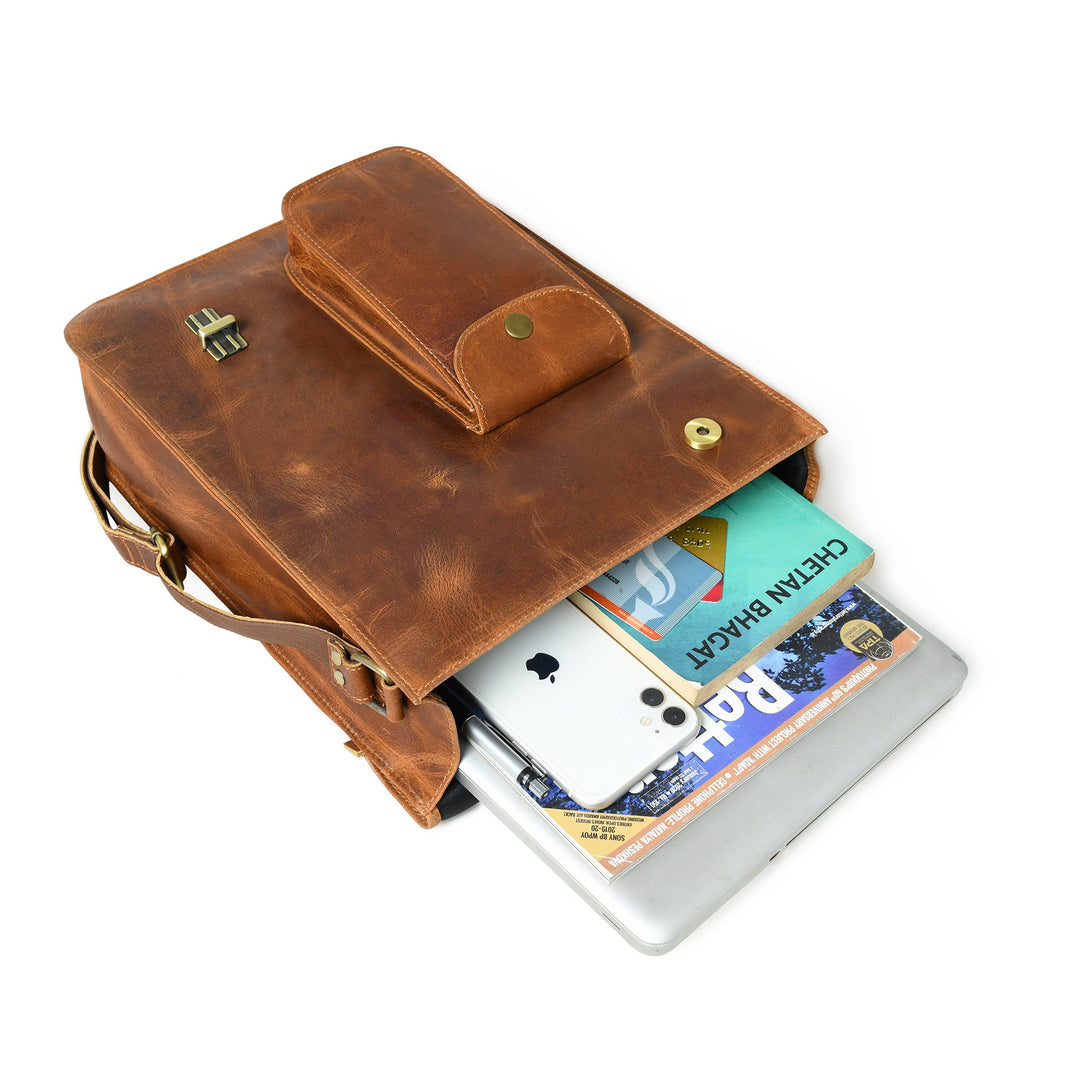 Brown leather crossbody bag open to hold laptop and cards