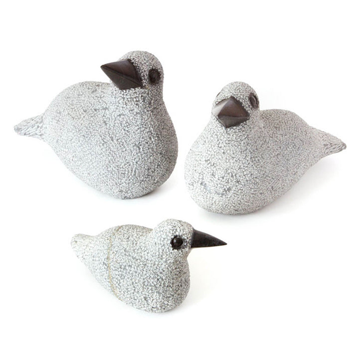 Hand-carved stone duck sculptures set of three, speckled light gray with dark beaks
