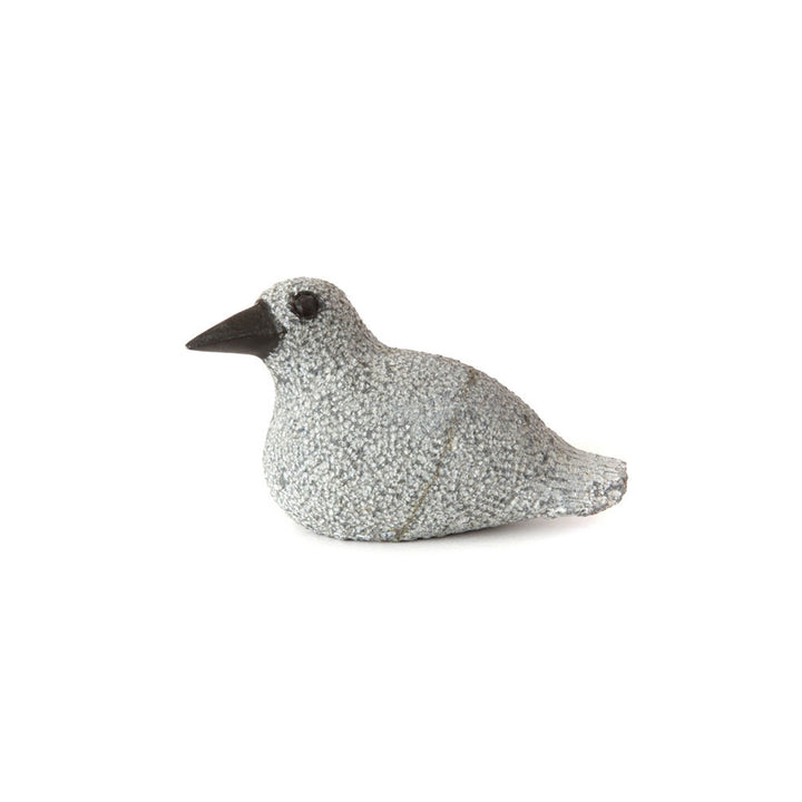 Stone duck sculpture in profile, speckled light gray finish with dark beak