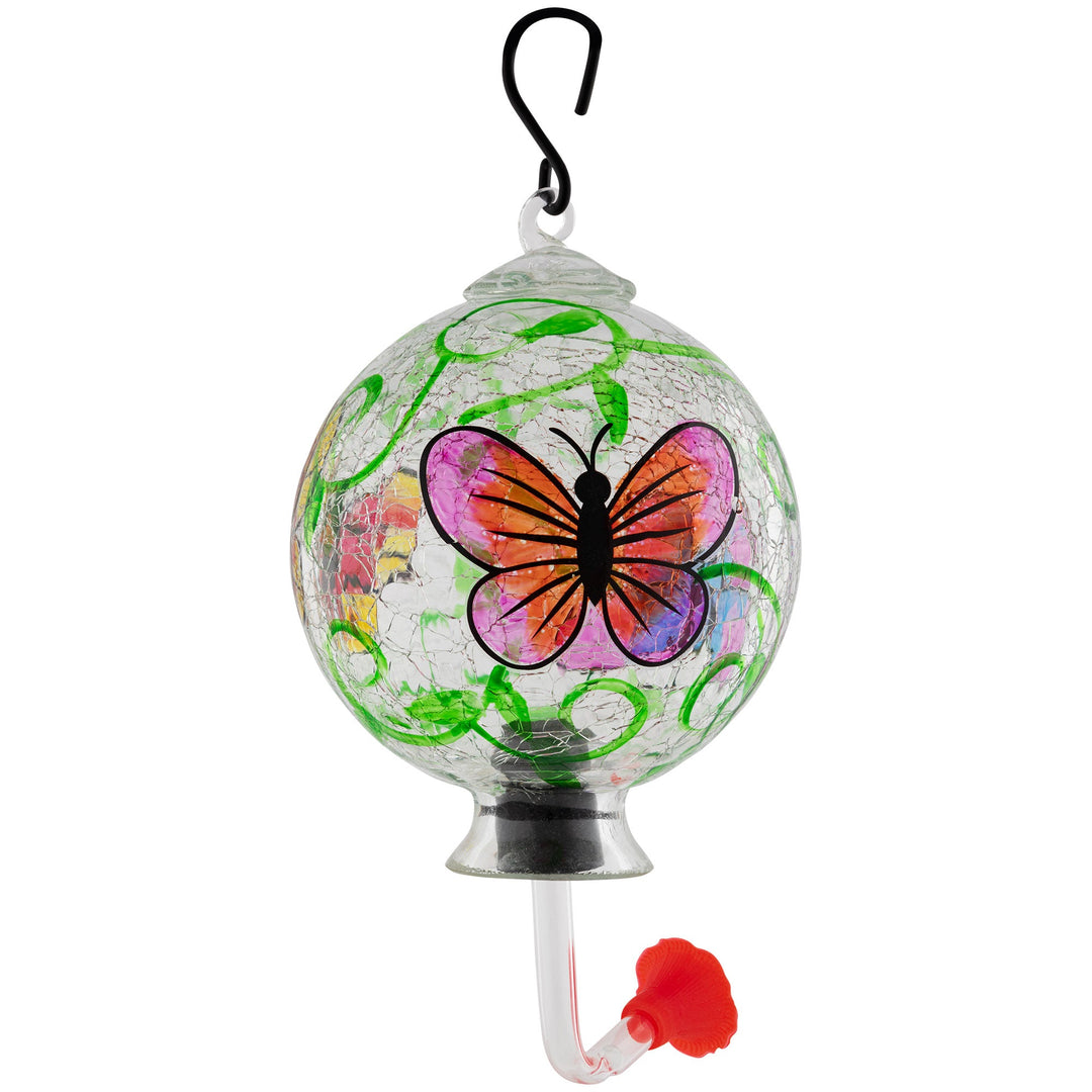 Hand-painted glass hummingbird feeder globe with green vines and an orange-purple butterfly