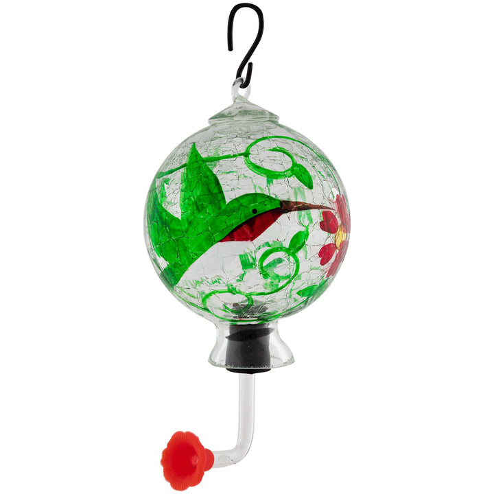 Hand-painted glass hummingbird feeder with green bird and red flower motif