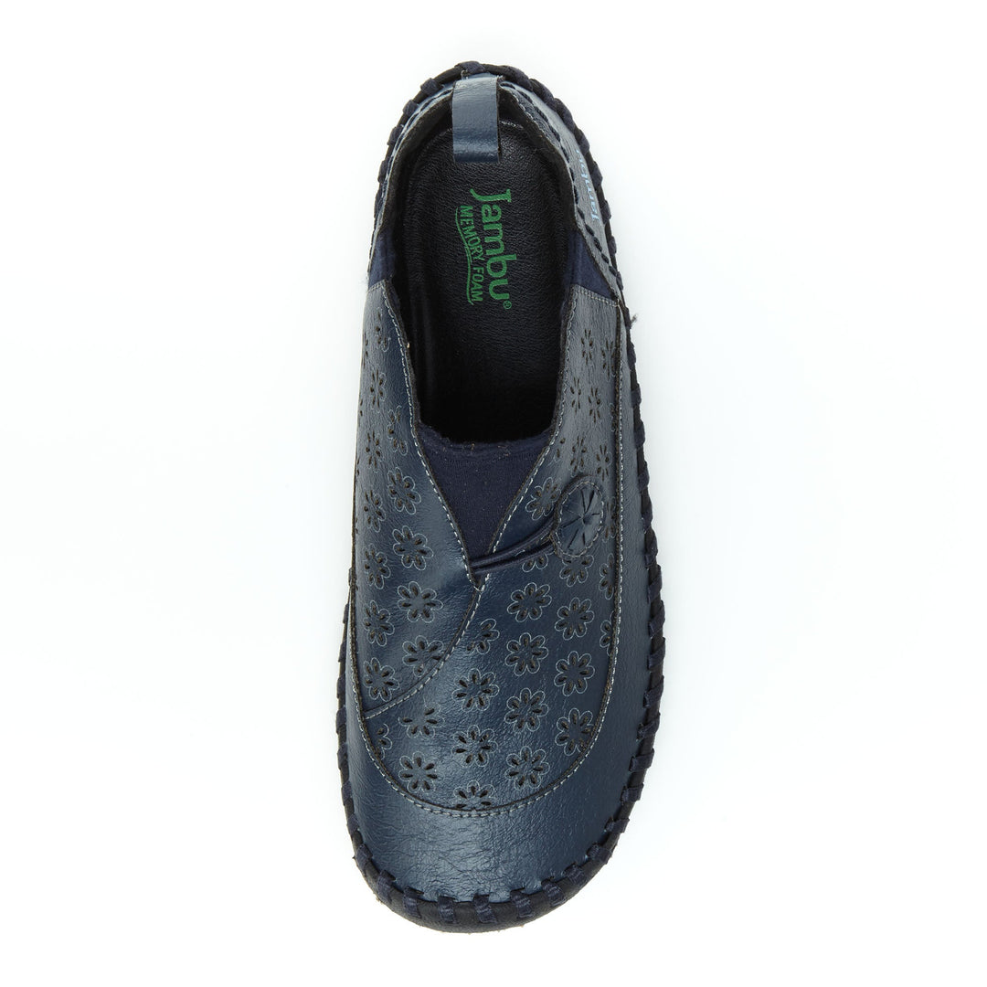 Navy slip-on loafer with floral cutout upper, rounded toe, and dark lining