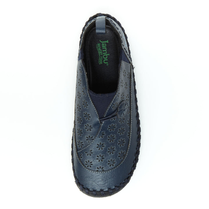Navy slip-on loafer with floral cutout upper, rounded toe, and dark lining