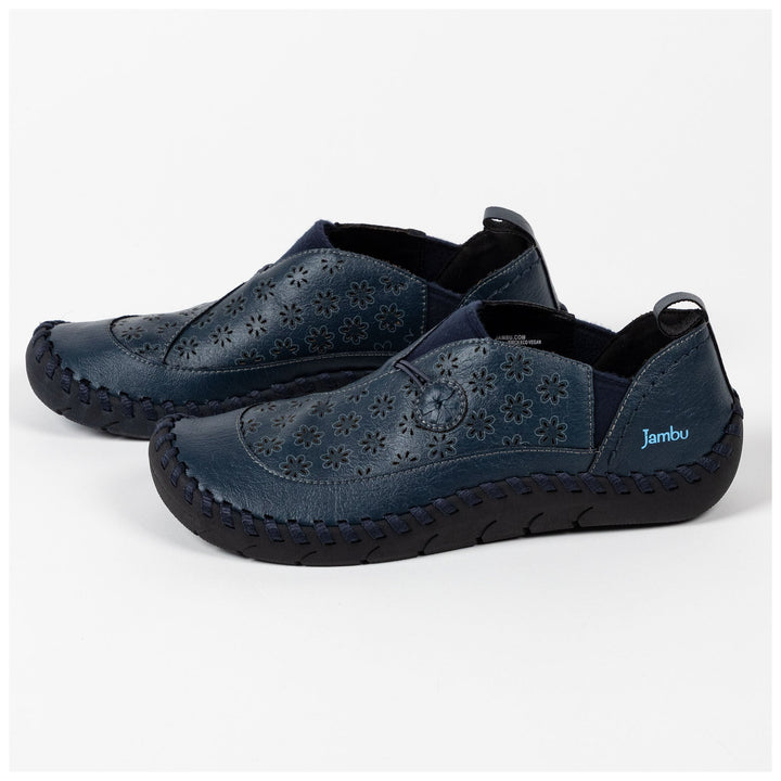 Navy perforated vegan loafer with floral cutout upper and slip-on design