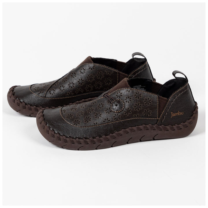 Brown vegan loafer slip-ons with floral perforated uppers and stitched platform sole