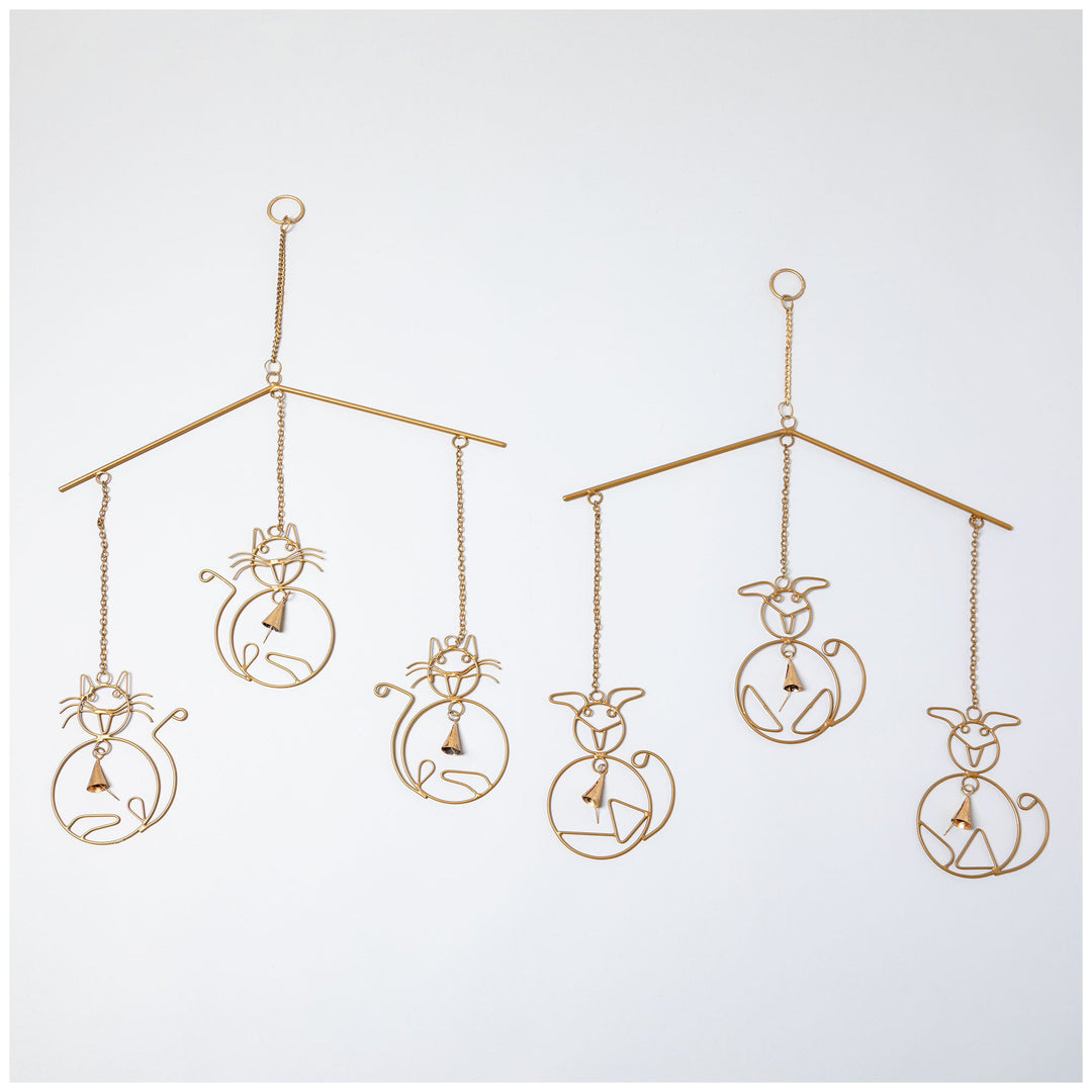 Gold iron wind chime with cat and dog silhouettes and hanging bells