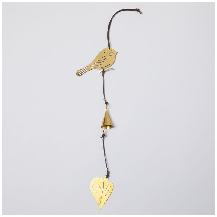 Gold-tone bird iron wind chime with heart pendant and hanging bell