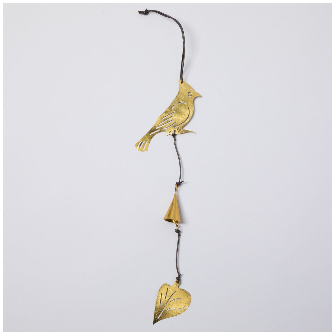 Gold-tone bird iron wind chime with dangling bell and heart pendant