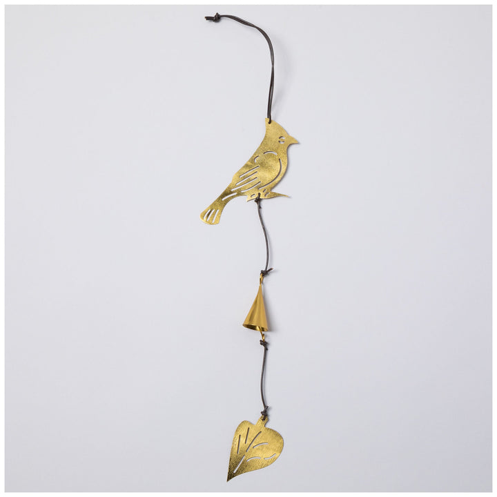 Gold-tone bird iron wind chime with dangling bell and heart pendant