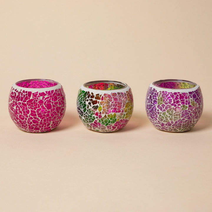 Set of 3 mosaic votive holders, two magenta and one multicolor, round open tops